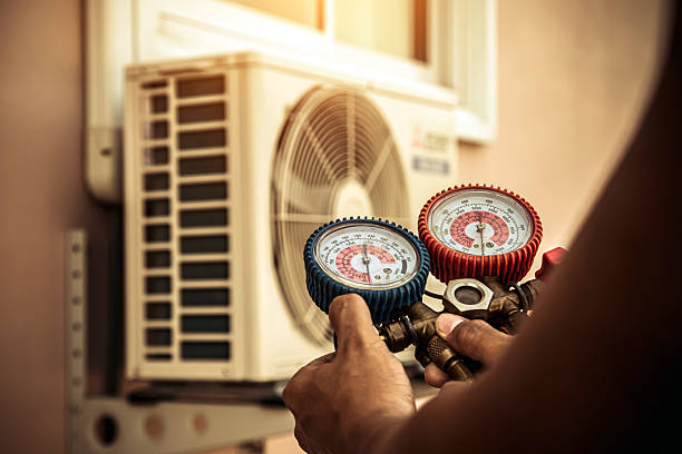 Professional Hvac technician working in Cadiz, OH